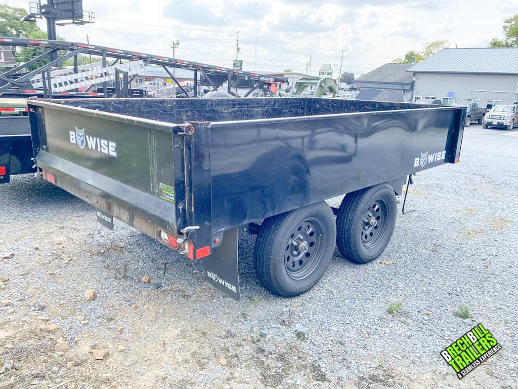 A 10ft long Used Bwise 7K Deck Over Dump Trailer for sale.