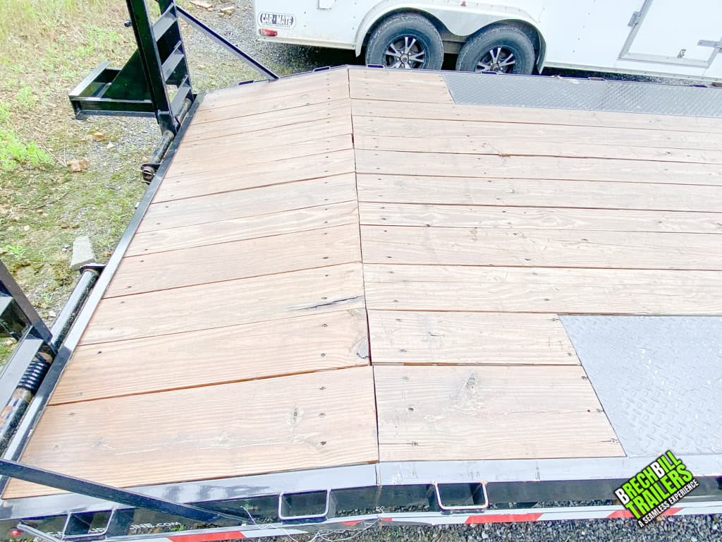 The deck on a Used CAM 11K Deck Over Equipment Trailer