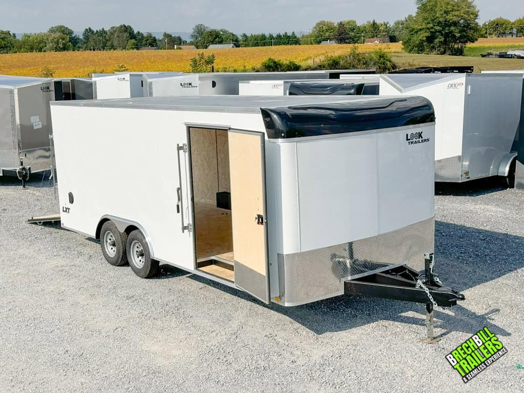 Full display of a new Look Flat Top XLT Bullnose Enclosed Trailer with side door open and ramp down.