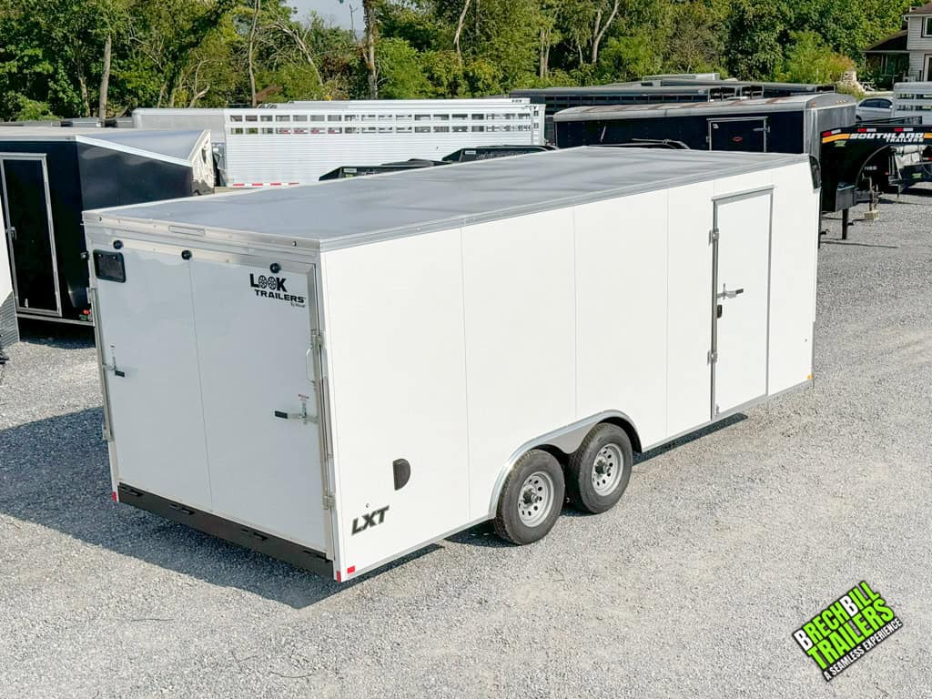 A white Look Flat Top XLT Bullnose Enclosed Trailer.