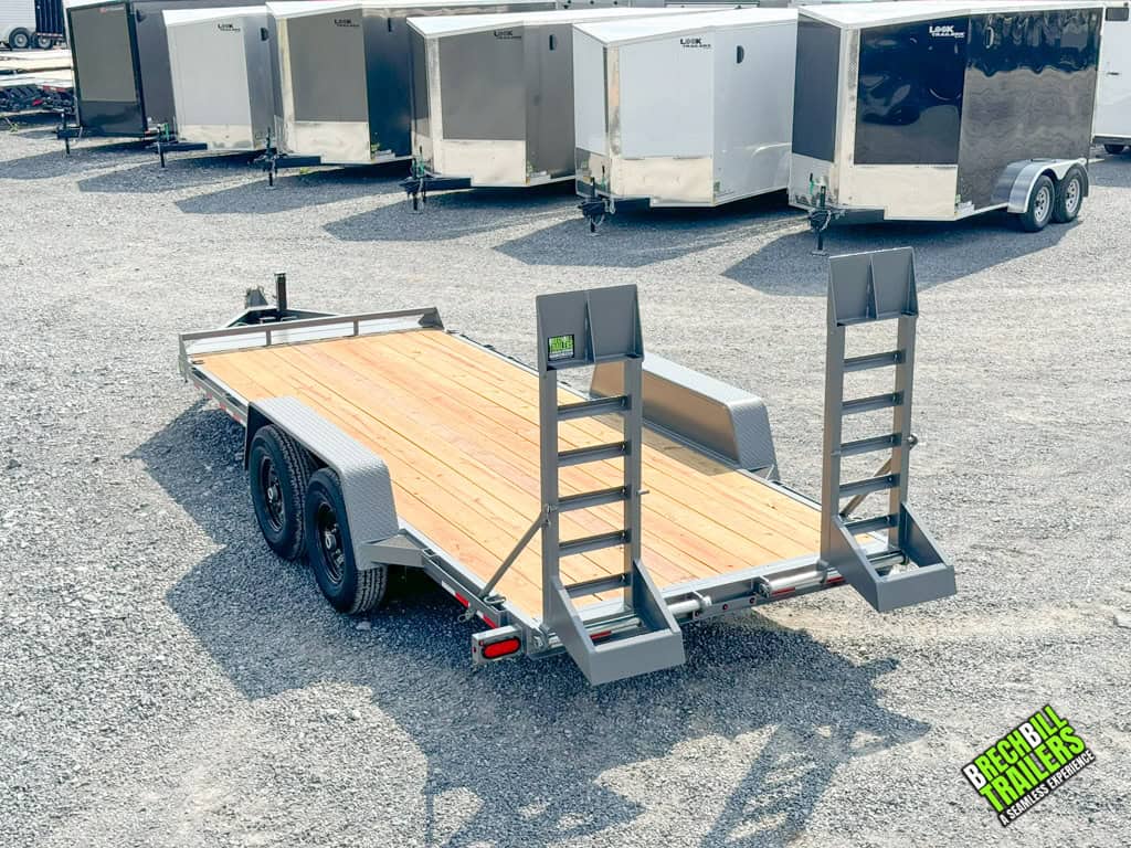 Gray ramps on the equipment trailer.