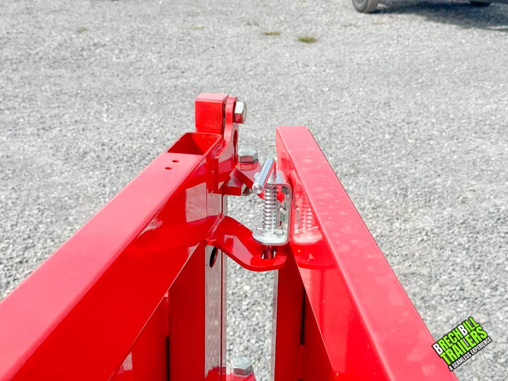 The gate on the Bwise LP LE 10K Low Pro Dump Trailer