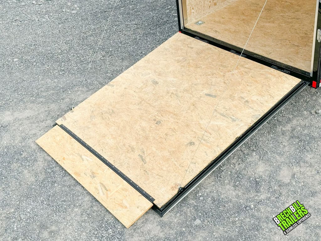 Brand new ramp door down on the floor.