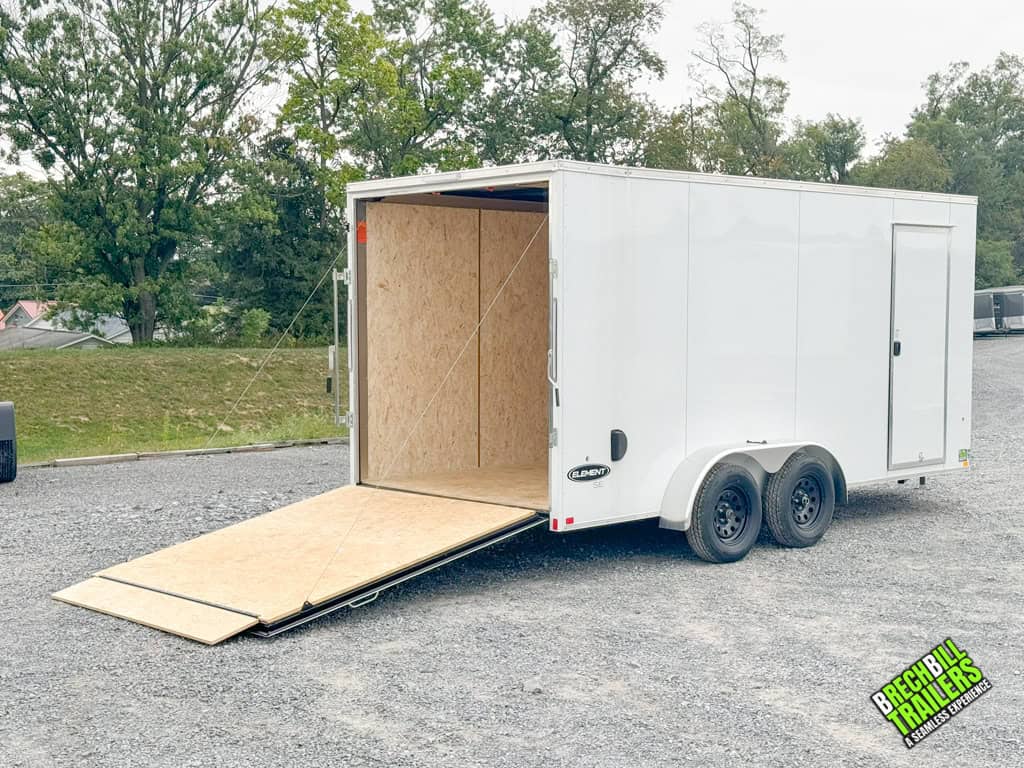 A new white Look Element SE Cargo Trailer for sale in the parking lot.
