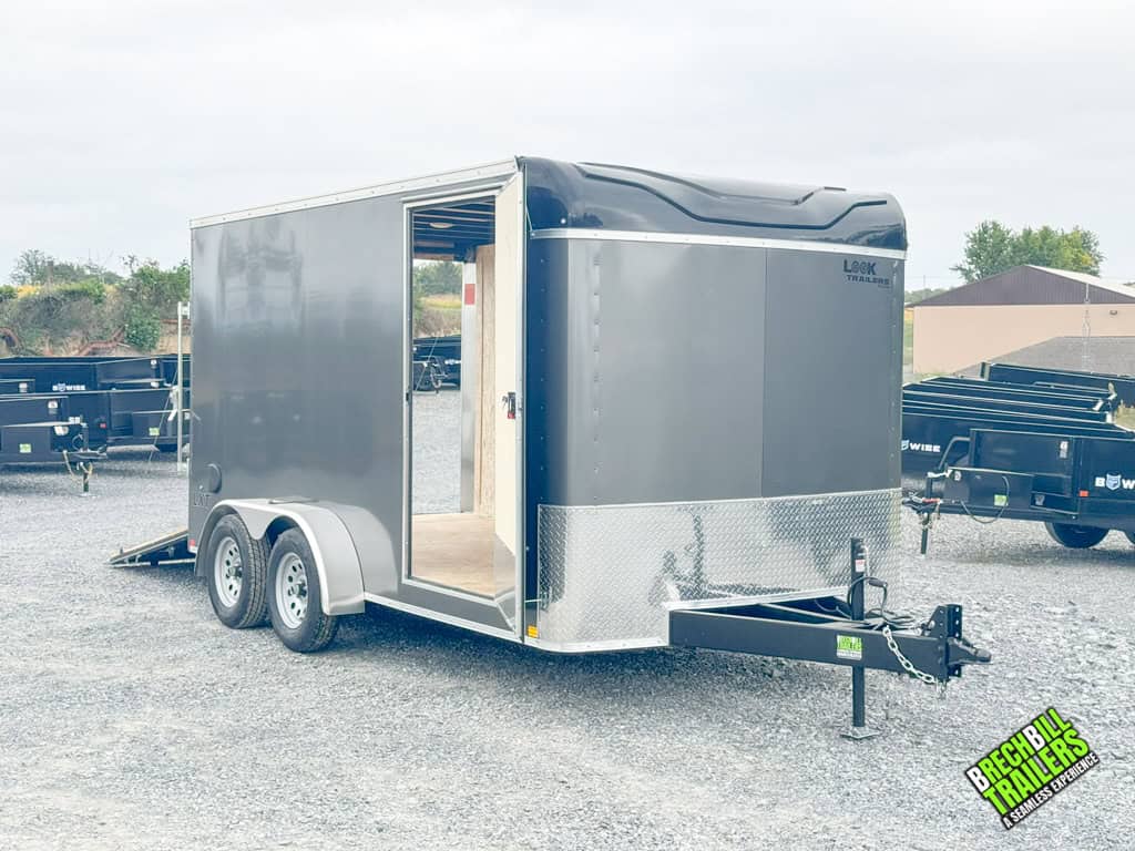 Demonstration of a new Look Enclosed Bullnose Car Trailer for sale with the door and ramp open.