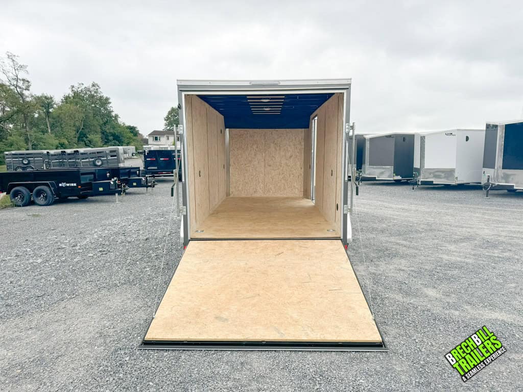 The door ramp down on a Look Enclosed Bullnose Car Trailer with a view straight into the back of it.