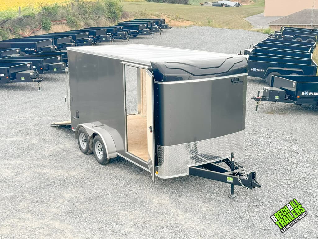 Front view of a new Look Enclosed Bullnose Car Trailer with extended tongue hitch.