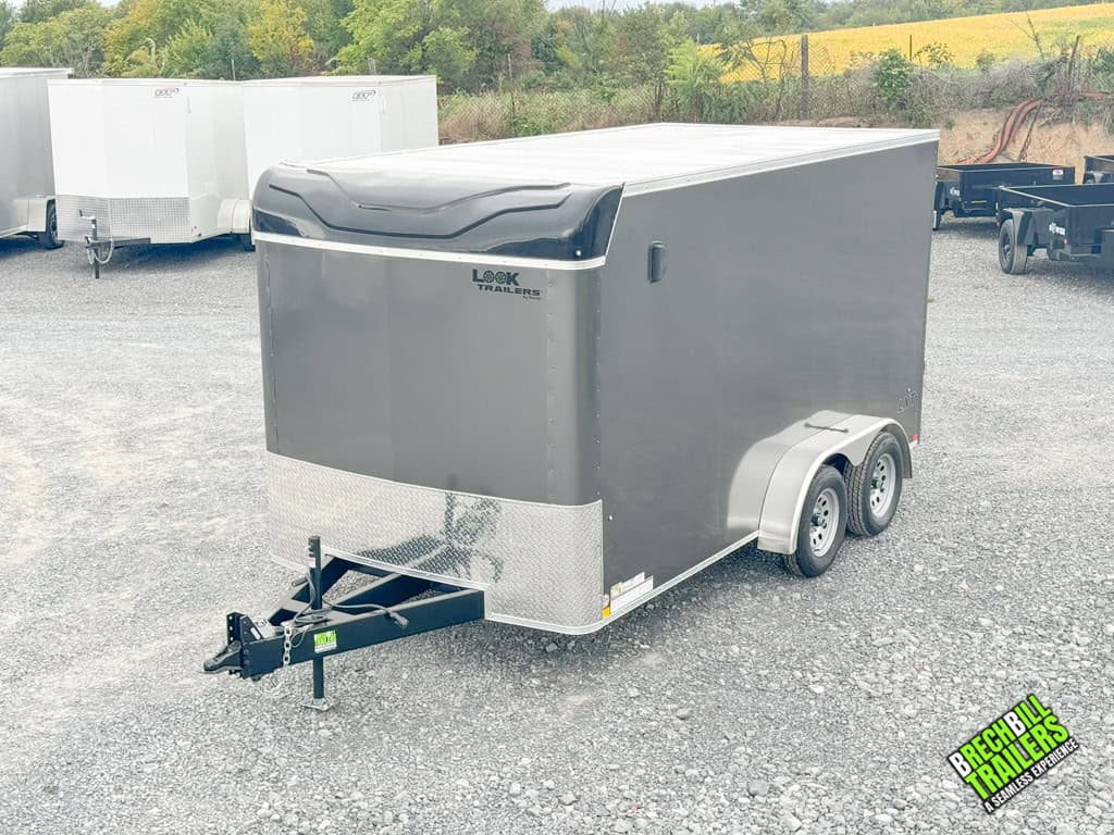 Full view of a new Look Enclosed Bullnose Car Trailer from the front.