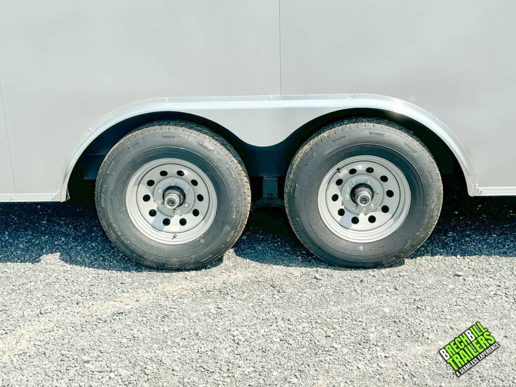 Wheels on a silver Look Element Flat Top Cargo Enclosed Trailer