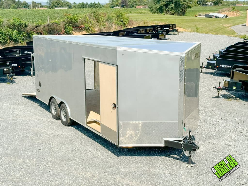 Looking down at a Look Element Flat Top Cargo Enclosed Trailer with all doors open.