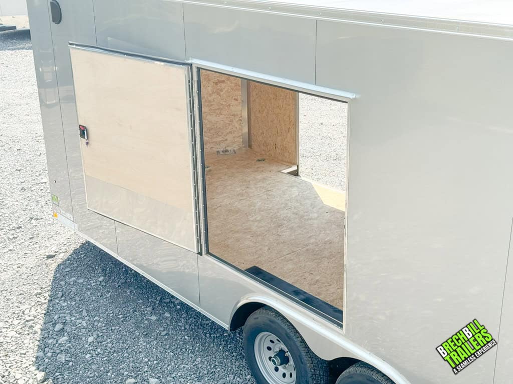 A window door open on the Look Element Flat Top Cargo Enclosed Trailer