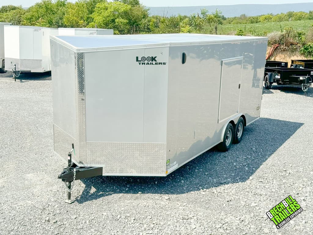Front view looking down the side of a new Look Element Flat Top Cargo Enclosed Trailer.