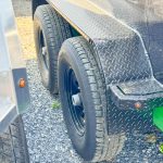 Wheels and fender on side of Horizon LZ7-16 dump trailer