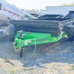 A Horizon 14k hd dump trailer with lime green and black color scheme.