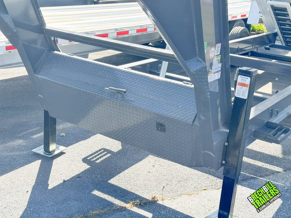 A parked Horizon HD gooseneck dump trailer