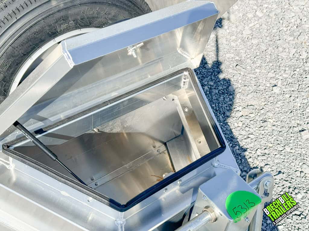 Aluminum toolbox on an EBY Deck-Over 16K Equipment Trailer