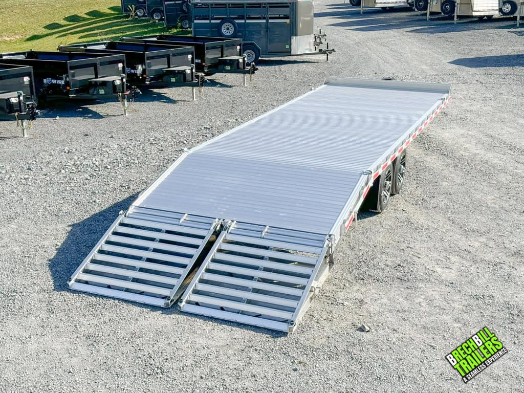 Ramps down on the EBY Deck-Over 16K Equipment Trailer