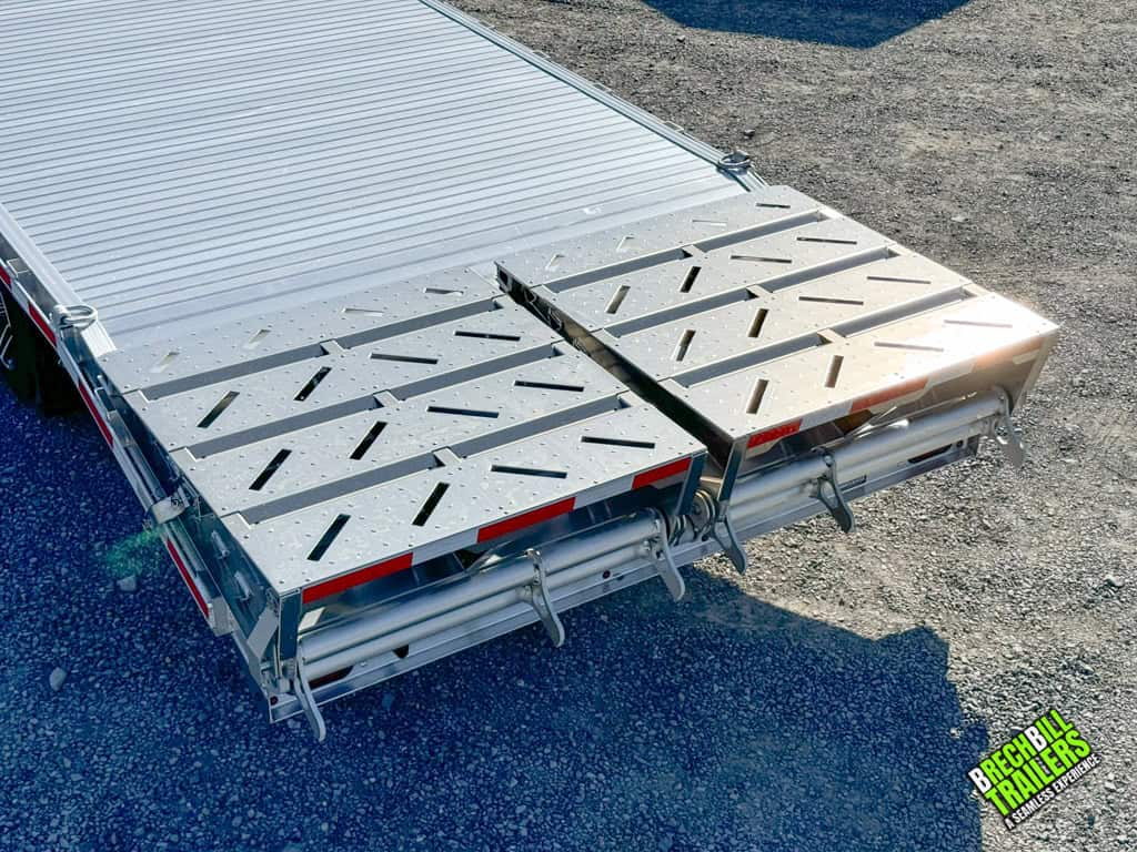 Ramps closed on the EBY Deck-Over 16K Equipment Trailer