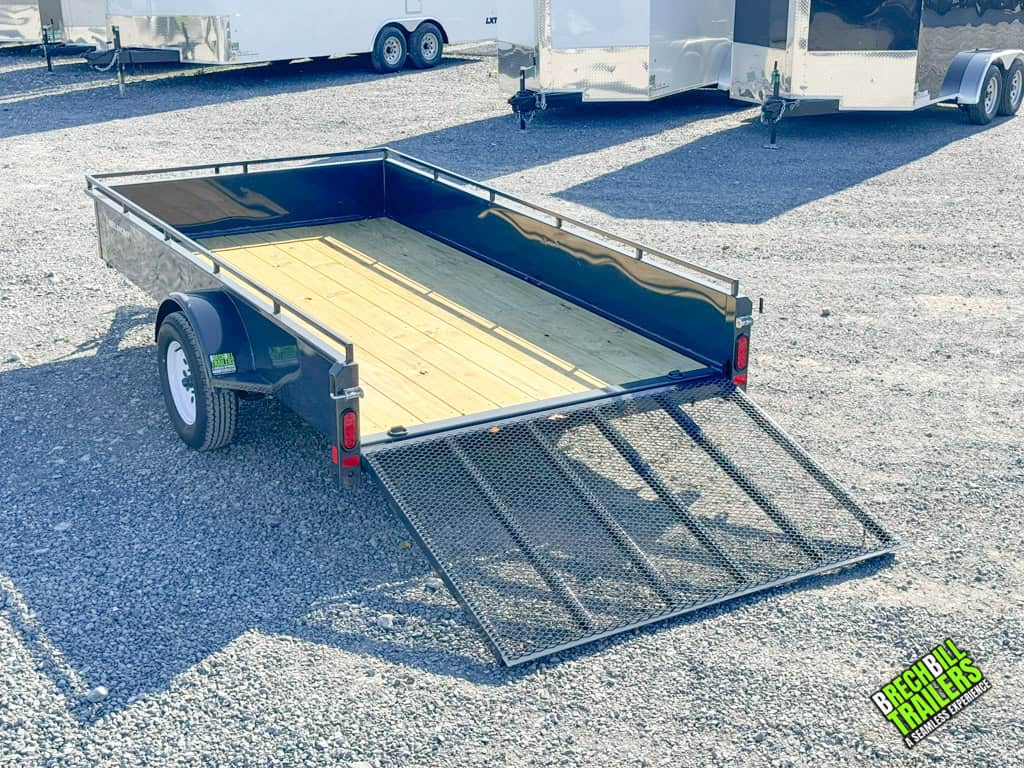 Full view of a Belmont Solid Side Utility Trailer with the ramp door down for easy loading