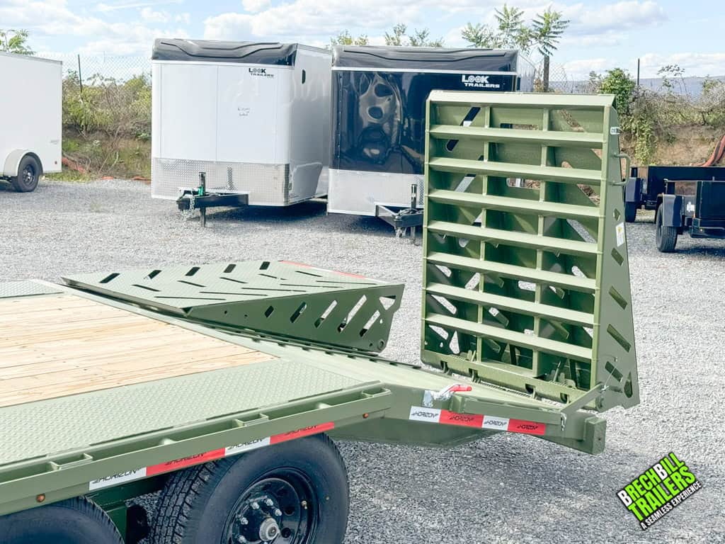 Green ramps on back of a Horizon 26ft deck over gooseneck trailer.