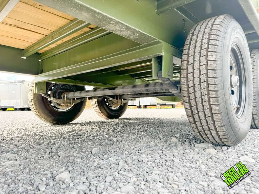 Dual axles and suspension on the Horizon 26ft Deck Over Gooseneck Trailer