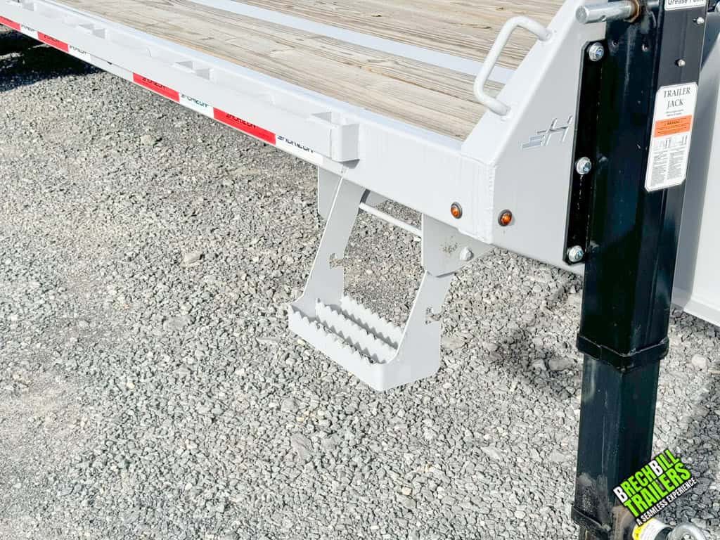 Cloudy gray colored gooseneck trailer.