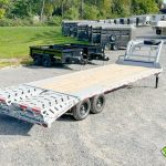 A 26ft Horizon deck over gooseneck trailer in cloudy gray.