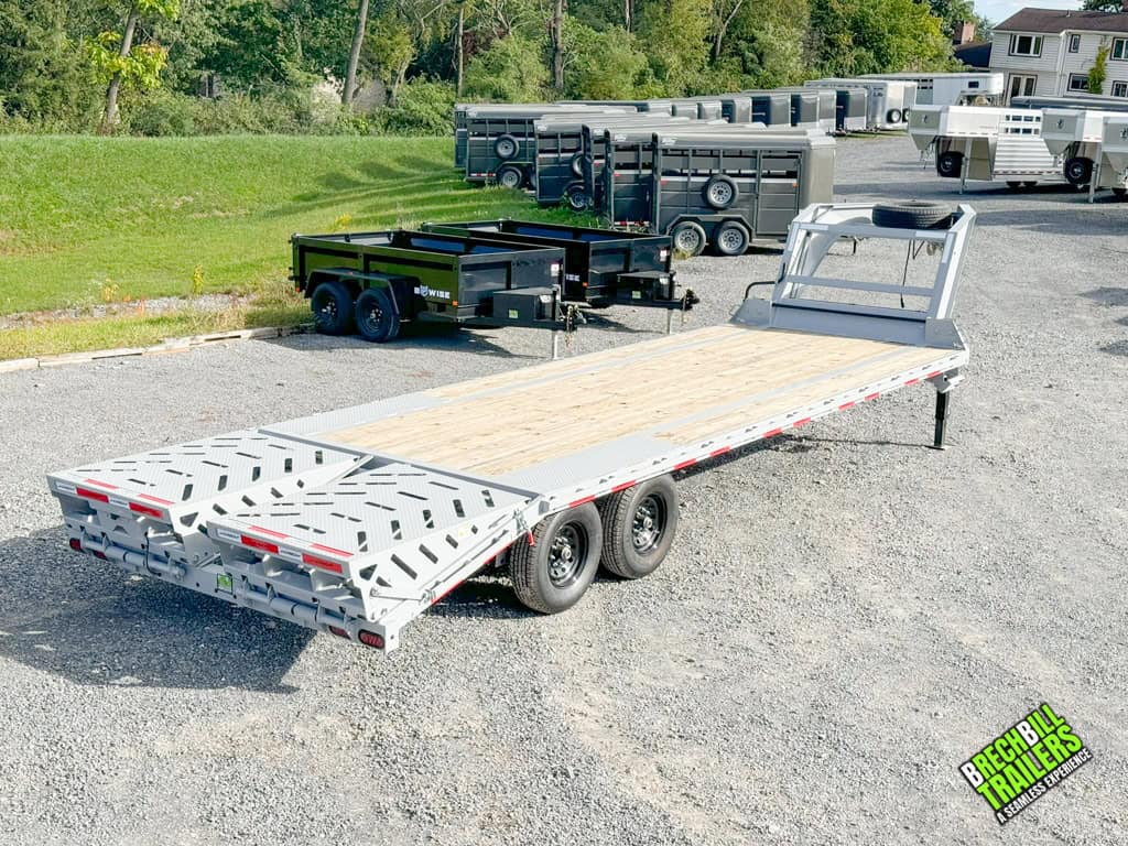 A 26ft Horizon deck over gooseneck trailer in cloudy gray.