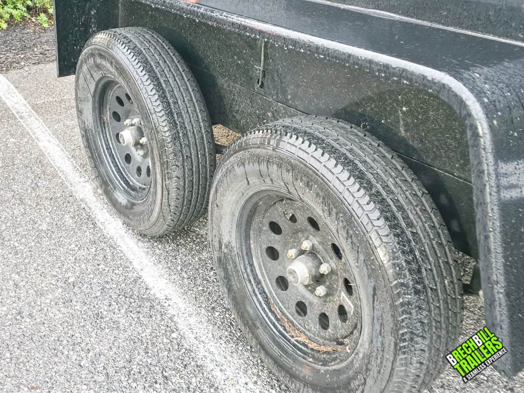 Wheels on the Used Bwise R Series 7K Dump Trailer