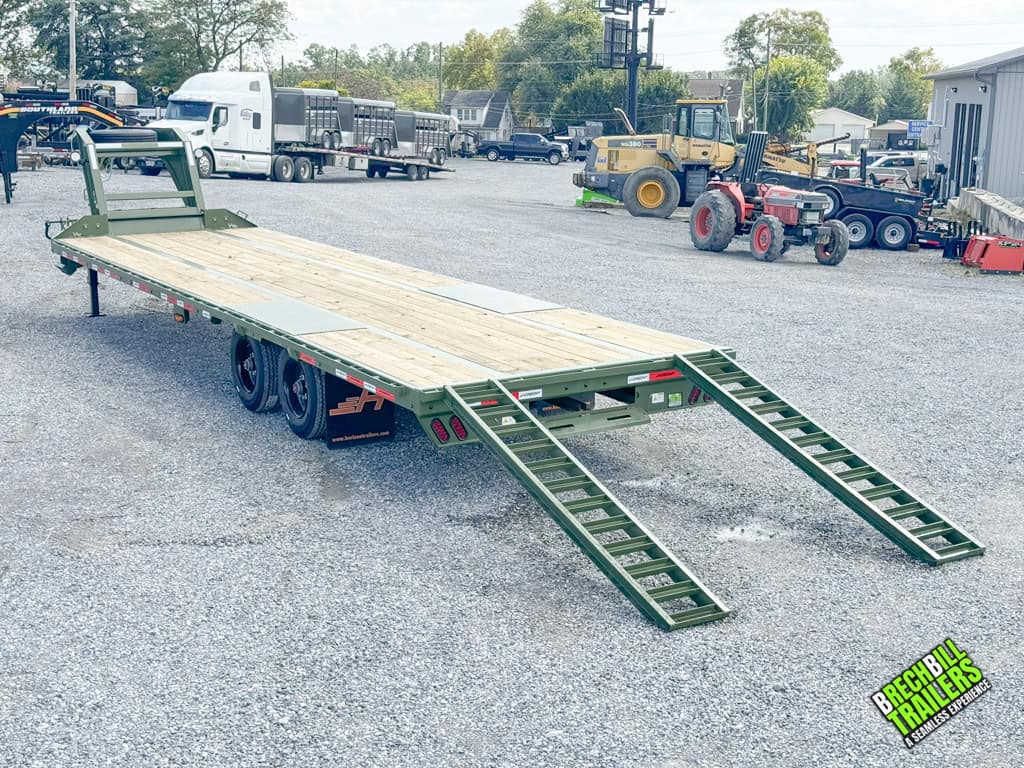 Horizon 30ft Deck Over Gooseneck Trailer with green ramps down and ready for easy loading.