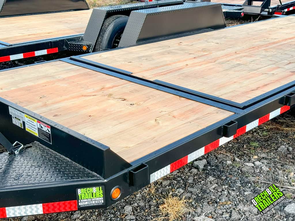 The 20ft wooden deck on a Bwise 15k gravity tilt deck trailer