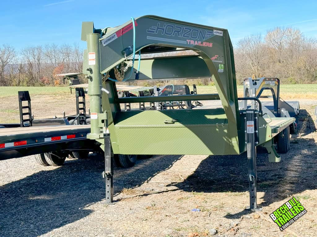 Parked 30ft Horizon flatdeck trailer being held up by its dual jacks