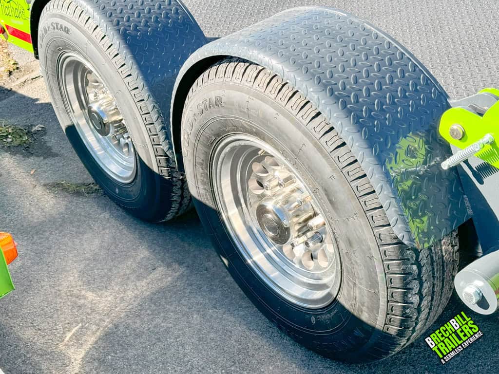 Wheels on the FlatTRak Lay Flat Scissor lift trailer