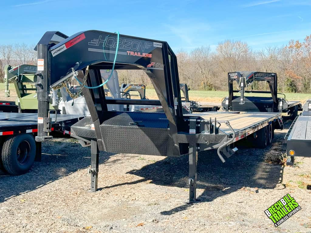 Horizon 30ft long deck over gooseneck trailer parked at the Brechbill dealership