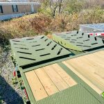 The ramps on a Horizon GN-FHZSS30 deck over trailer