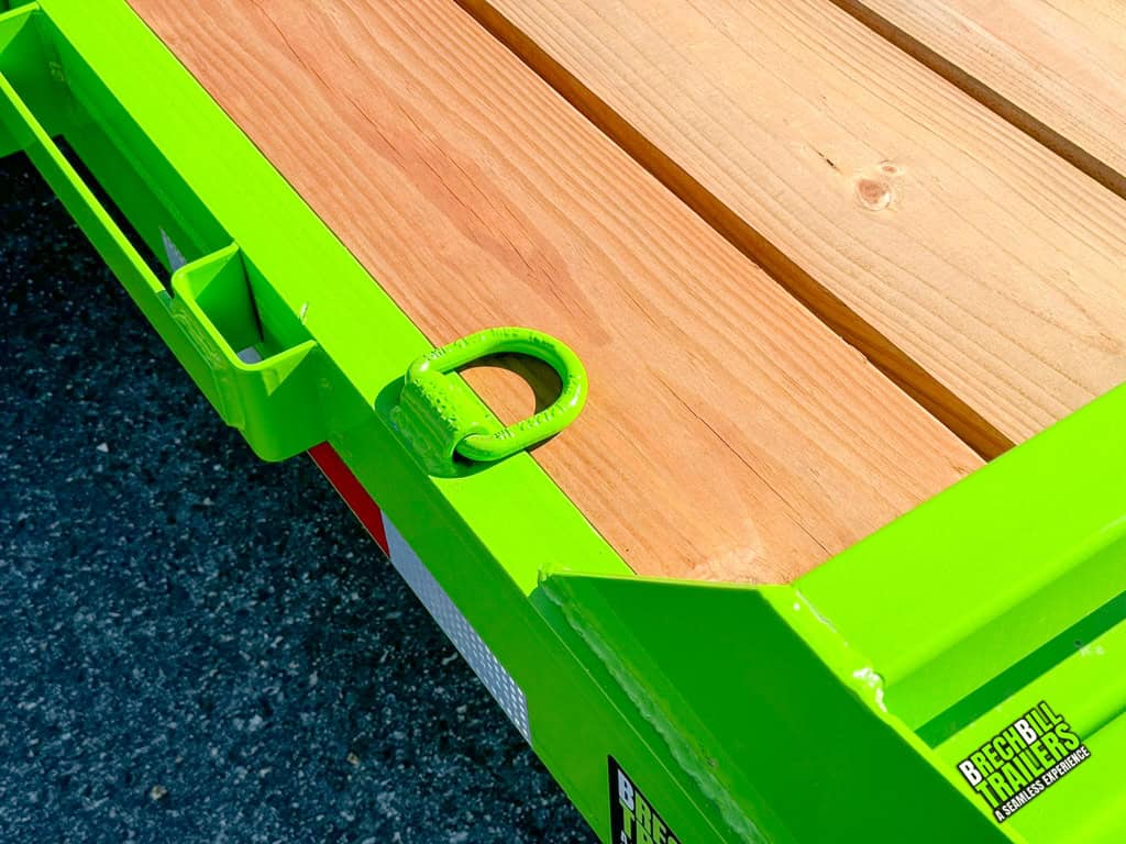 Lime green d-rings on a Bwise 12k low pro equipment trailer
