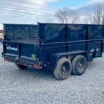 Side view of a USED Bwise LP LE Low Pro Dump Trailer