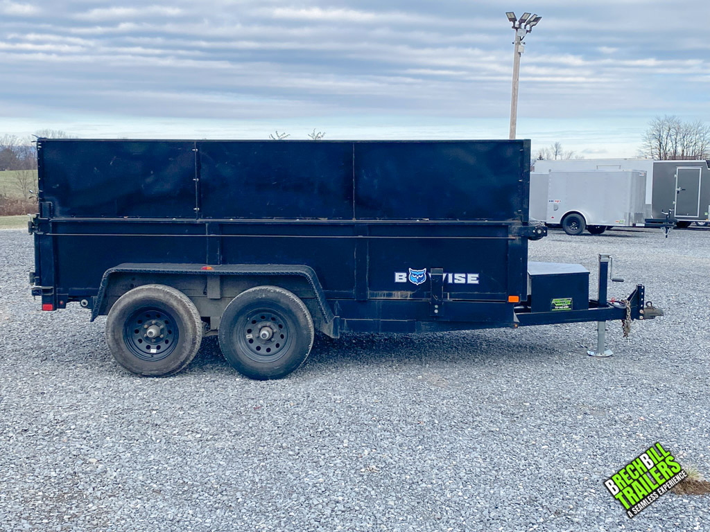 Side view to see wheels and paint condition on the USED Bwise LP LE Low Pro Dump Trailer