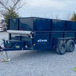 A black USED Bwise LP LE Low Pro Dump Trailer