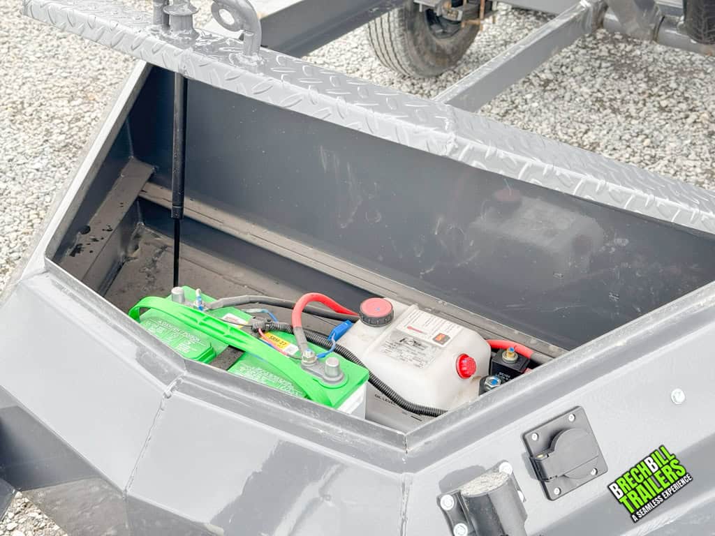 Inside the front box with battery and hydraulic reservoir