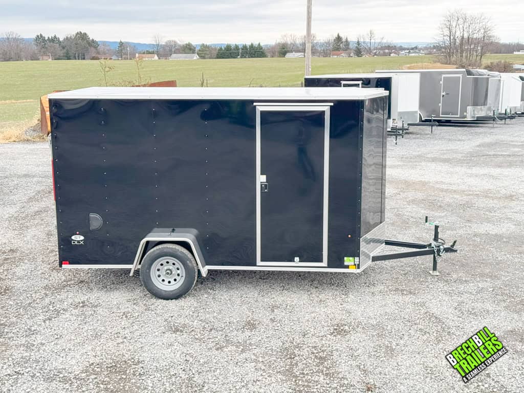 A black Look ST DLX Enclosed Cargo Trailer from the side