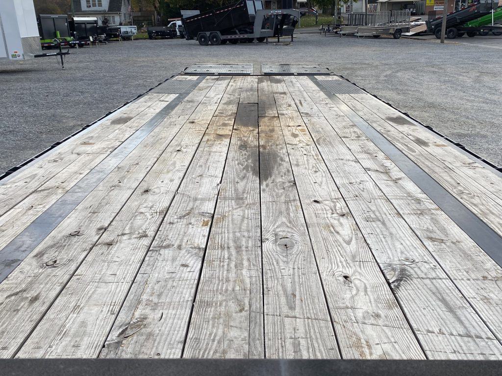 The floor on the USED Big Tex 16K Single Wheel Tandem Axle Gooseneck Trailer