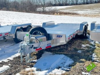 EBY Aluminum Heavy Duty Gravity Tilt Trailers parked in the lot ready for sale