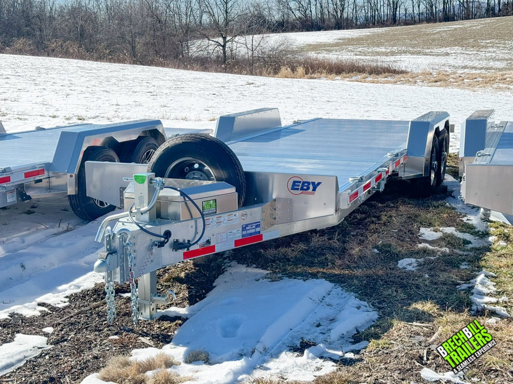 EBY Aluminum Heavy Duty Gravity Tilt Trailers parked in the lot ready for sale