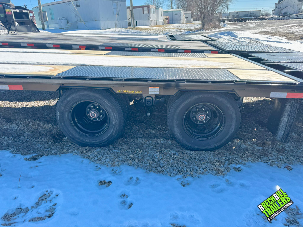 Big Tex 23.9K Tandem Dual Gooseneck Trailer side view showing new wheels