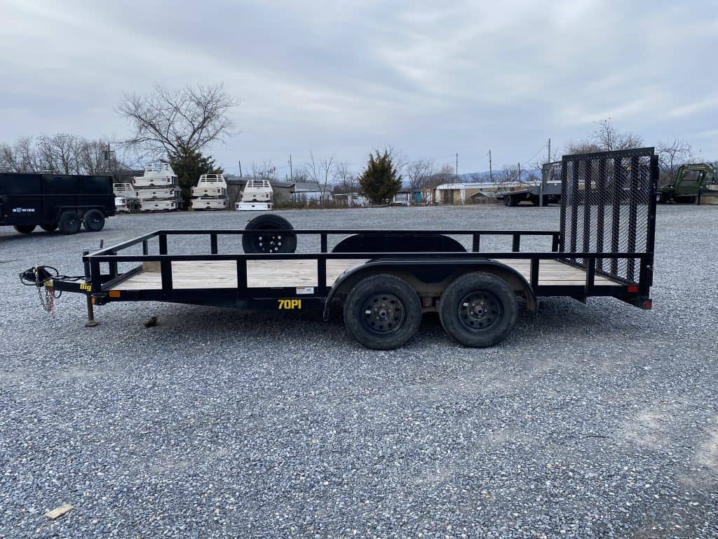Side of a parked big tex utility landscape trailer for sale in excellent condition