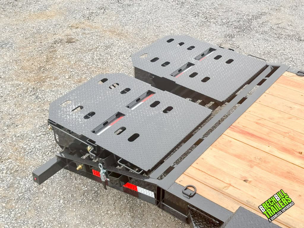 Black ramps on the back of the trailer for easy loading