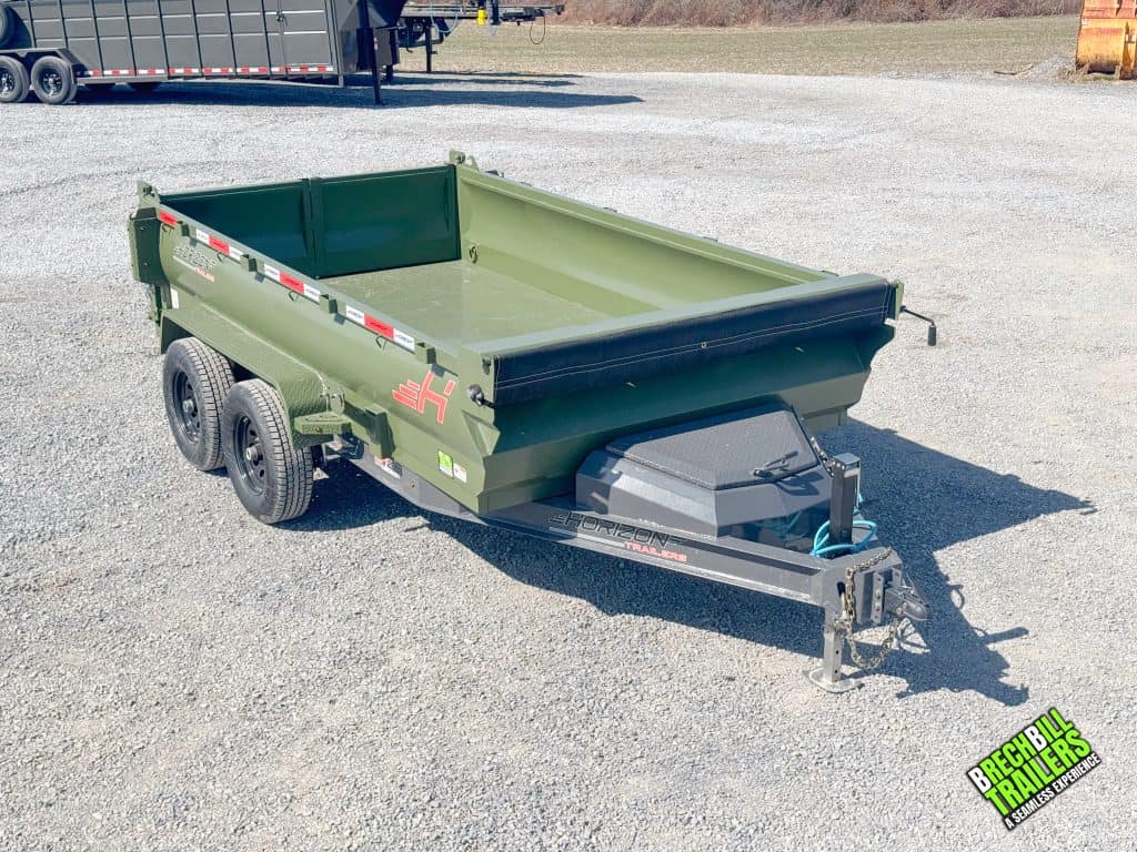 Green dump trailer with tarp kit and gray frame