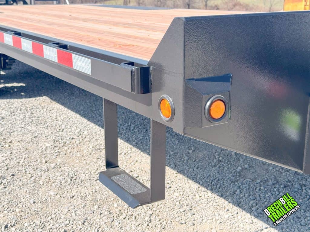 The black step up on the side of the trailer