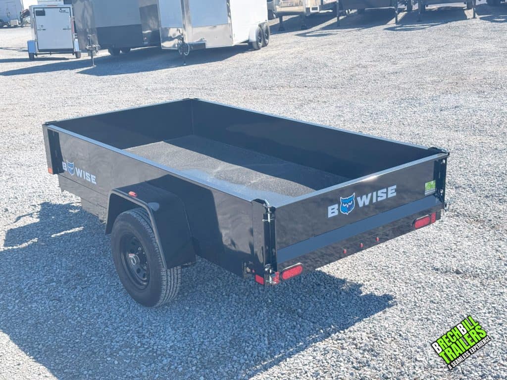 A Bwise R Series 5×10 Dump Trailer parked in the yard.